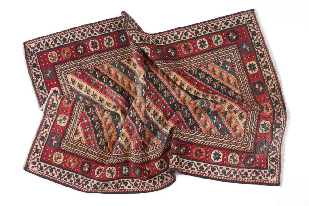 Patterned rug with distressed finish